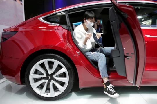 After Tesla deal, Shanghai to speed up cancellation of foreign ownership limits