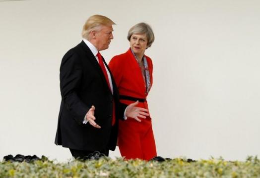Trump arrives in 'hot spot' Britain, questioning May's Brexit plan
