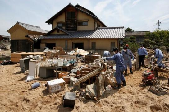 Japan struggles to restore water supply to flood-hit towns as temperatures soar