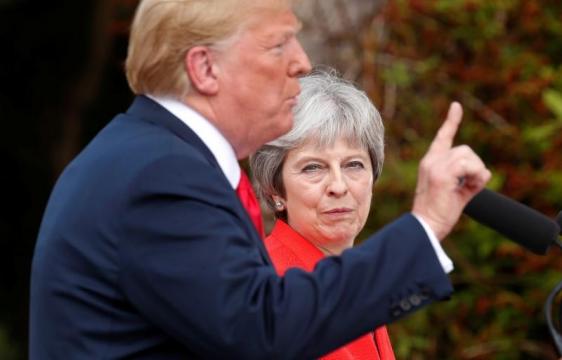 British PM May says Donald Trump told her to sue the EU over Brexit