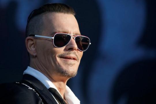 Johnny Depp and ex-managers settle lawsuit over finances