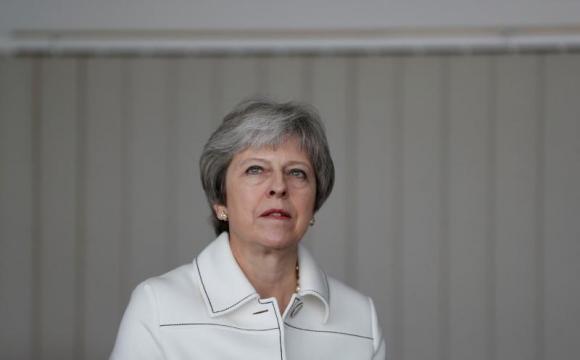 UK PM May narrowly avoids defeat in parliament on EU trade laws