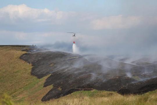 British moorland fire extinguished after more than three weeks