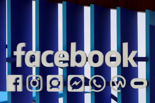 Facebook disappoints on revenue, active users; shares fall 9 percent