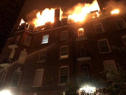 Firefighters tackle blaze in London's West Hampstead flat