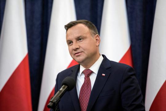 Thousands protest as Polish president signs judicial appointments law