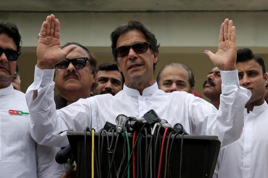Pakistan's Khan in coalition talks with small party, independents