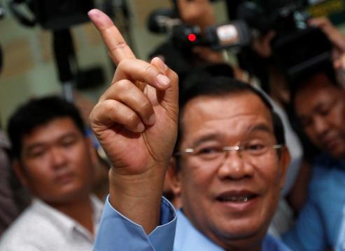 Cambodia dismisses poll criticism, opposition laments 'death of democracy'