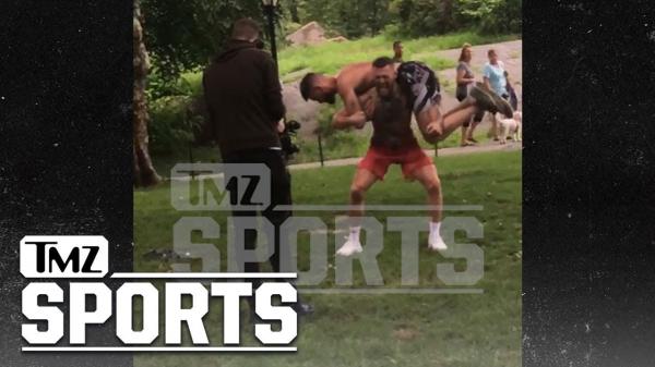 Conor McGregor Squats a Human Man In Central Park | TMZ Sports