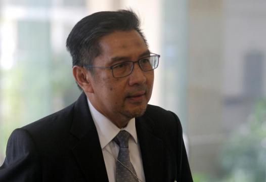 Malaysia civil aviation chief resigns over MH370 lapses