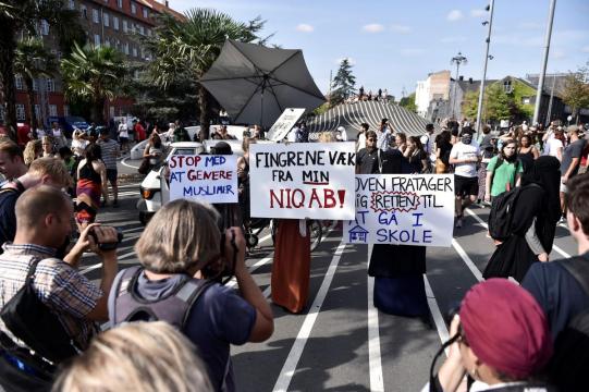 Hundreds protest in Denmark against new ban on face veils in public