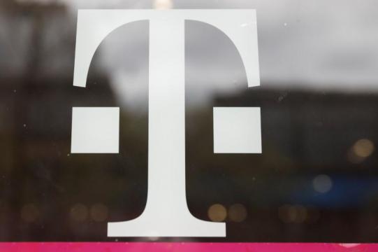 T-Mobile adds wireless subscribers; awaits Sprint deal approval