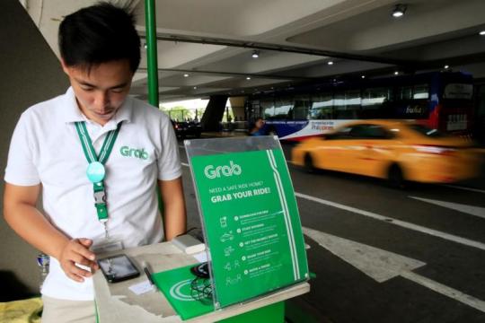 Philippines sets rules for 'virtual monopolist' Grab after Uber deal