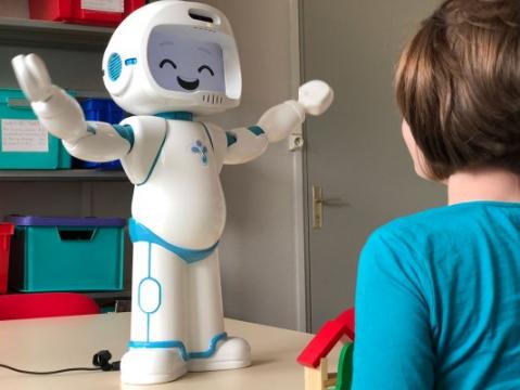 This happy robot helps kids with autism