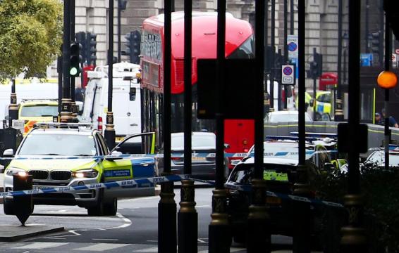 Man arrested, pedestrians injured as car hits barriers at UK parliament