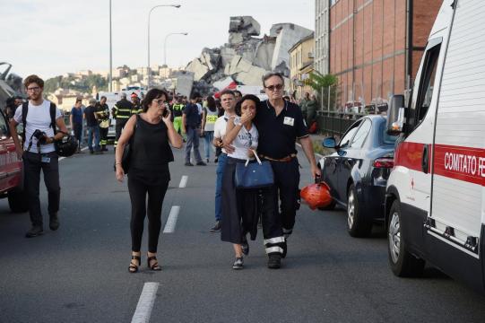 Search for survivors after Italian motorway collapse kills at least 26