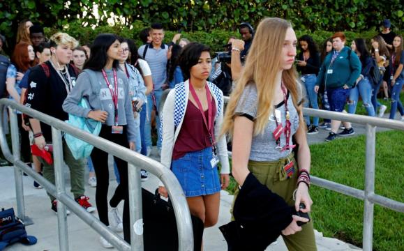 Florida school opens for class with new security after massacre
