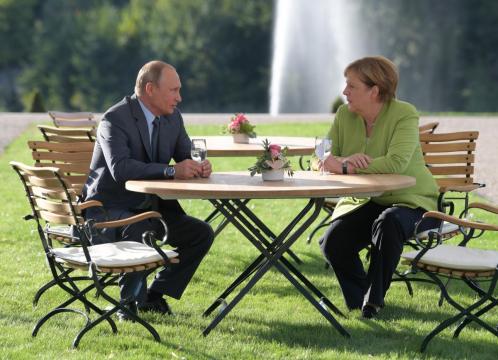 Merkel, Putin tackle tough topics in meeting outside Berlin