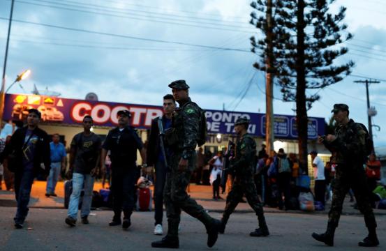 Brazil sends army to border as Venezuelans flee crisis at home