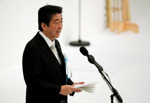 Japan PM Abe says relations with China back on 'normal track': paper