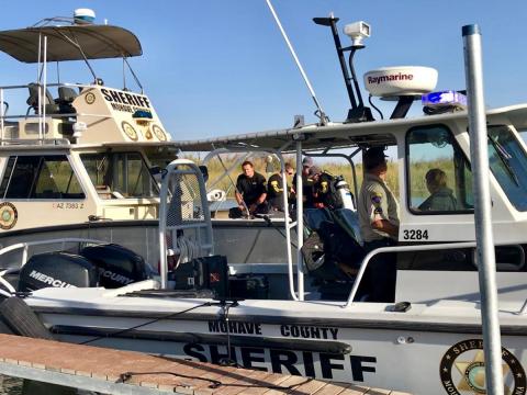 Woman found dead, three people missing in Arizona boat crash