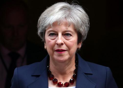 May says still working towards October Brexit deal deadline
