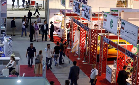 Syrian trade fair shows road to recovery still strewn with debris of war