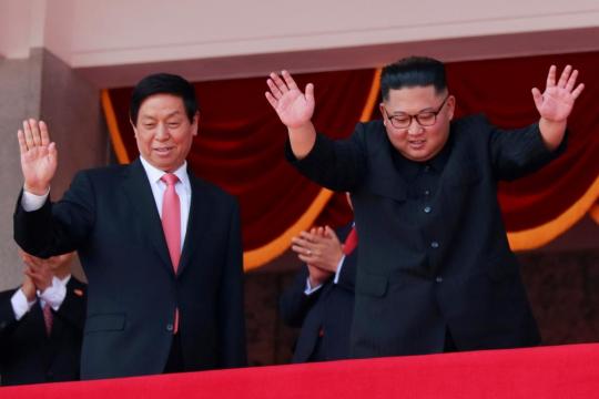 No long-range missiles, North Korea military parade features floats and flowers
