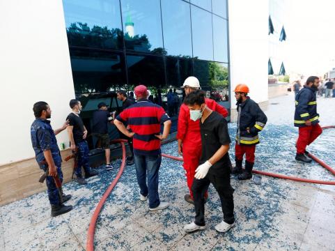 Gunmen attack headquarters of Libya's state oil firm, two staff killed