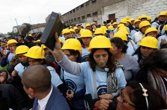 Soccer fans, evangelicals clash at Peru stadium over land dispute