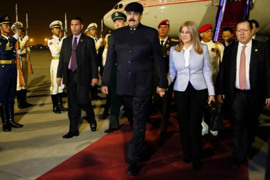 China's foreign minister, head of state planner met with Venezuela's Maduro