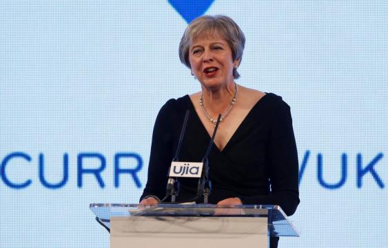 May vows to defend Jews and Israel, in dig at Corbyn