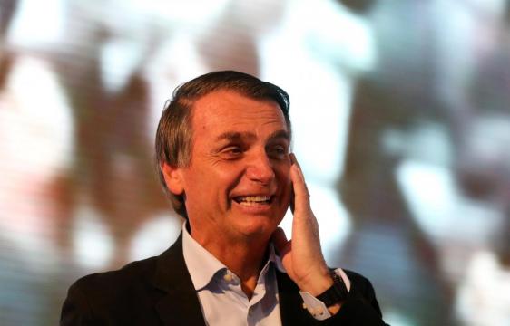 Brazil's Bolsonaro firms lead, leftist Haddad jumps to second: poll