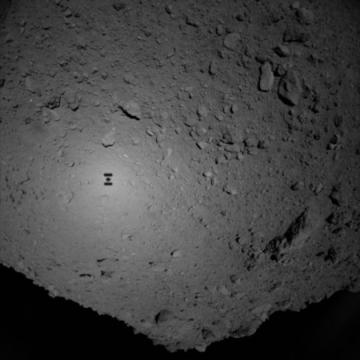 Japan’s Hayabusa 2 spacecraft drops off rovers at an asteroid and takes a shadowy selfie