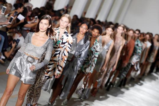 Cavalli raises hemlines in body conscious show in Milan