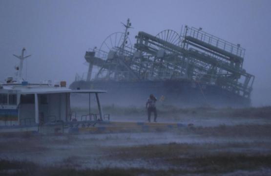 Powerful typhoon bears down on flood-battered Japan