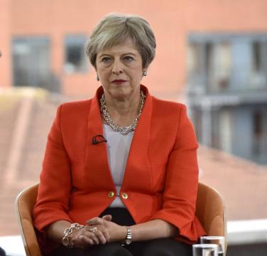 'Let's come together,' PM May tackles Brexit critics