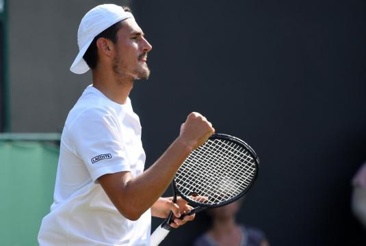 ATP roundup: Tomic ends three-year title drought