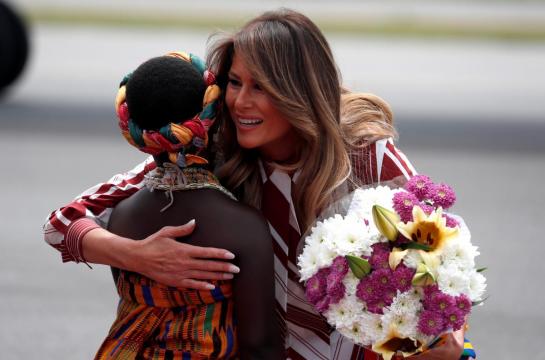 First lady Melania Trump coos over kids in Ghana on solo Africa trip