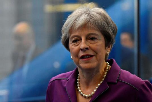 Challenging her critics, May embraces Brexit 'opportunity'