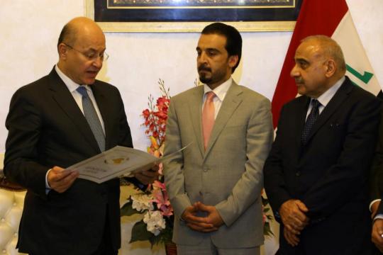 Iraq names new president and premier, ending deadlock