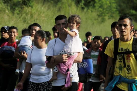 Honduran migrant group treks north as U.S. calls for tighter borders