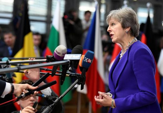 To overcome Brexit impasse, May open to extending transition