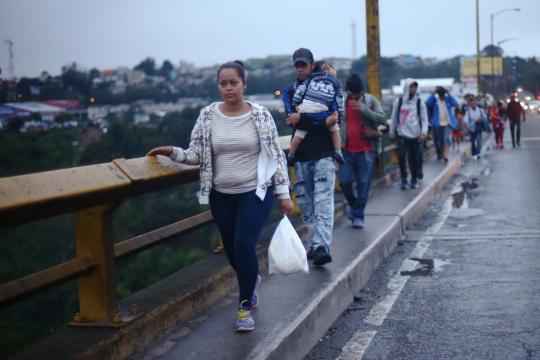 Trump threatens to send military, shut border as Central Americans migrate
