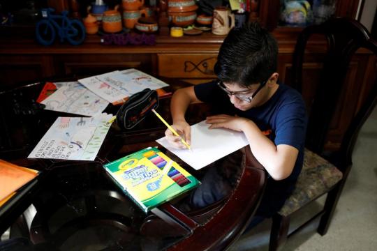 Venezuela teen's political cartoons sketch his country's downfall