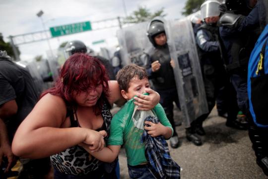 Migrant caravan halted on Mexico-Guatemala border, pressure to turn back mounts