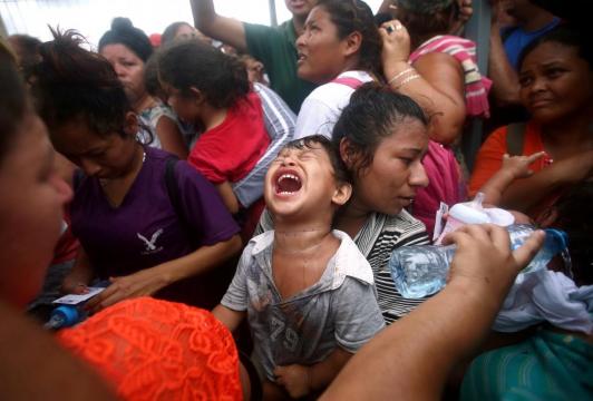 Thousands of caravan migrants take shelter in southern Mexico