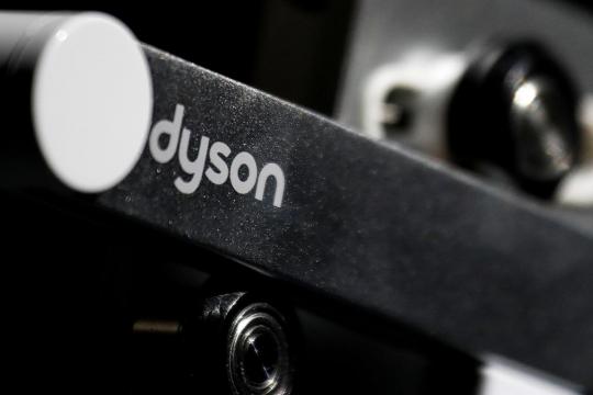 Why did Dyson pick Singapore to build its electric car?