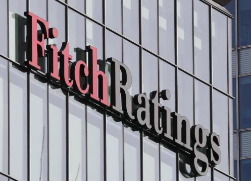 Fitch says it no longer assumes Britain will get a smooth Brexit