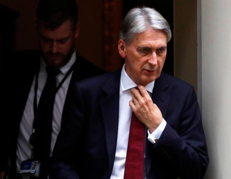 Hammond warns Brexit rebels not to risk easing of austerity